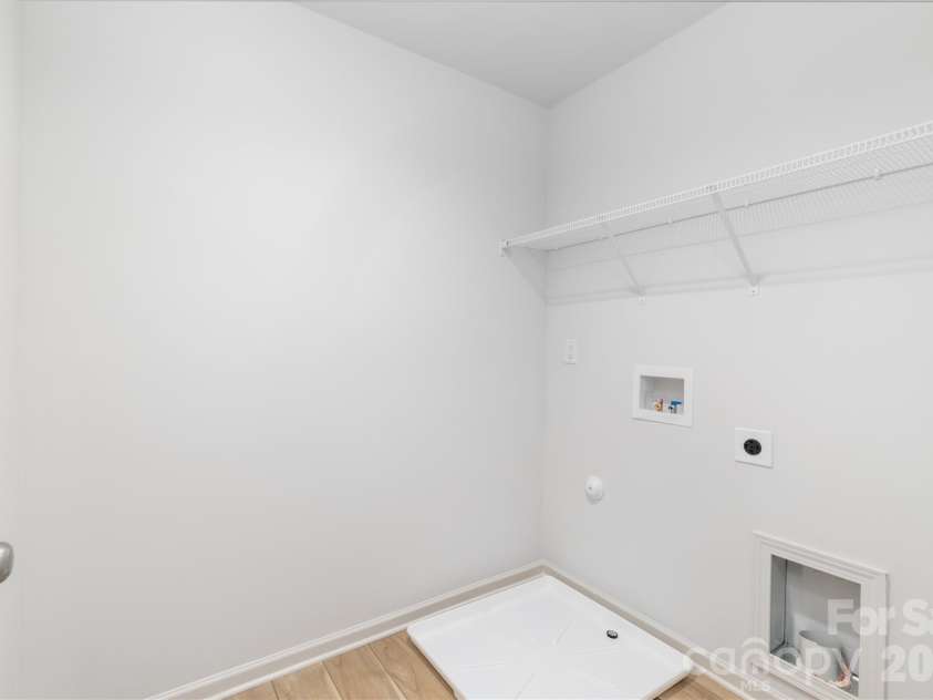 4251 Acorn Street, Charlotte, NC 28205.  MLS# CAR4335264, YatesRealty ID 3406. Representative Photo: Laundry