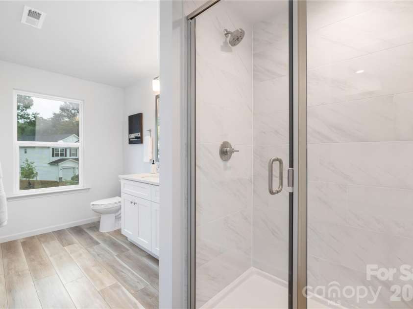 4251 Acorn Street, Charlotte, NC 28205.  MLS# CAR4335264, YatesRealty ID 3406. Representative Photo: Primary Bathroom