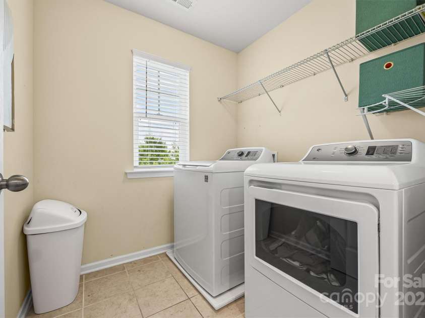 6030 Thorburn Way, Belmont, NC 28012.  MLS# CAR4292026, YatesRealty ID 34061. Laundry Room w/ Shelving
