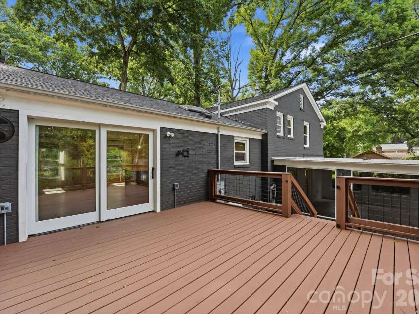 5301 Glenham Drive, Charlotte, NC 28210.  MLS# CAR4396260, YatesRealty ID 34068. Rear Deck off Kitchen 
