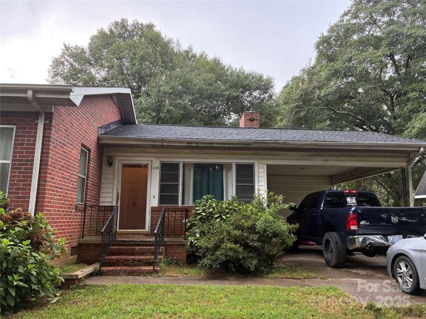1125 Elva Ira Street, Gastonia, NC 28054.  MLS# CAR4295064, YatesRealty ID 34069. 1125 Elva Ira car port