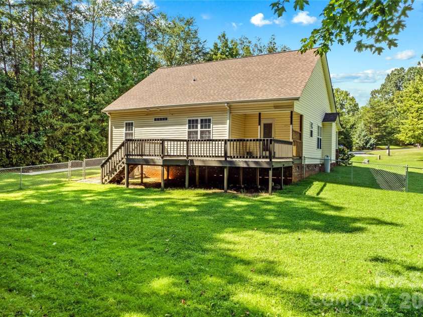 215 Meadow Lake Drive, Salisbury, NC 28146.  MLS# CAR4291335, YatesRealty ID 3407. Large backyard with spacious deck in perfect shape!