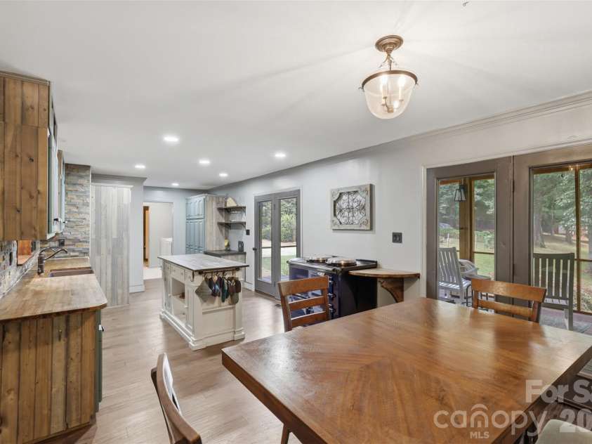 8301 Waxhaw Creek Road, Waxhaw, NC 28173.  MLS# CAR4393275, YatesRealty ID 34071. Walking into kitchen