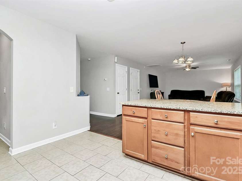 1300 Dunmore Court, Clover, SC 29710.  MLS# CAR4295252, YatesRealty ID 34073. Kitchen view to great room