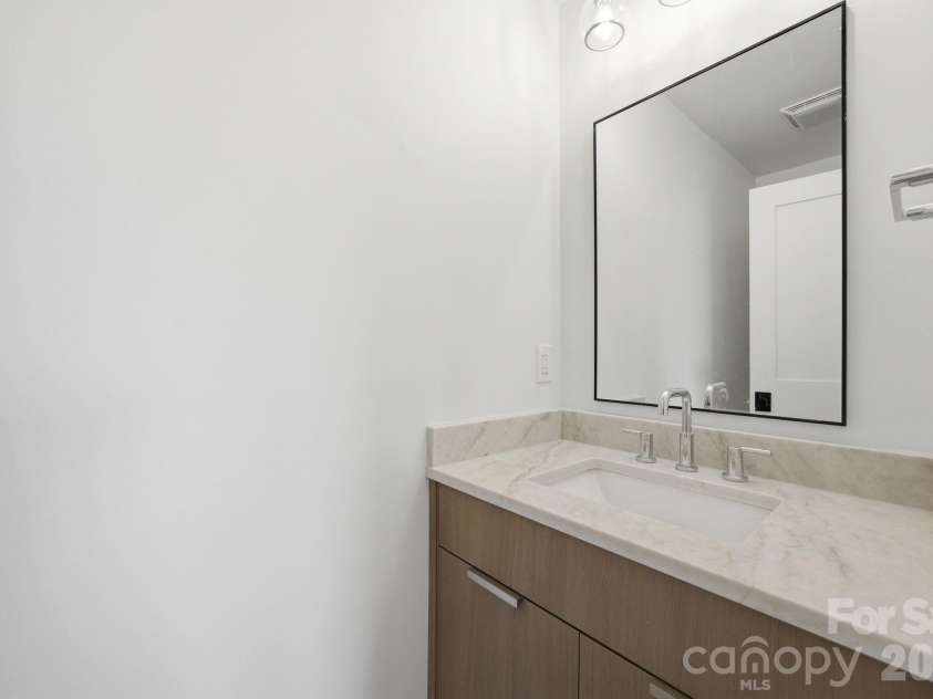 2117 Lombardy Circle, Charlotte, NC 28203.  MLS# CAR4344981, YatesRealty ID 34085. Powder Room on 3rd level