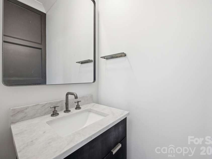 2117 Lombardy Circle, Charlotte, NC 28203.  MLS# CAR4344981, YatesRealty ID 34085. Powder Room on first level