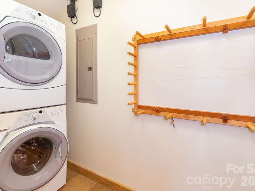 29 Gardner Drive, Asheville, NC 28803.  MLS# CAR4383535, YatesRealty ID 34087. Guest House. Dedicated laundry area thoughtfully designed for functionality and organization.