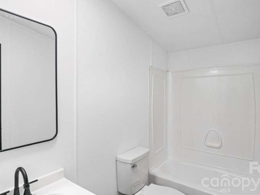 4277 Apex Drive, Maiden, NC 28650.  MLS# CAR4397194, YatesRealty ID 34089. Hall Bathroom