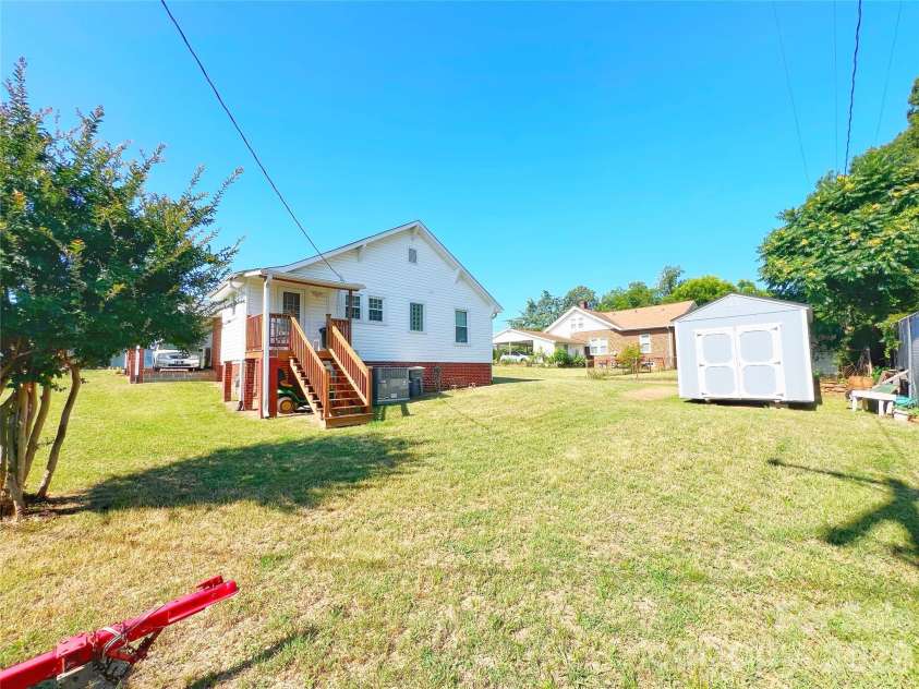 108 Snipe Street, Kannapolis, NC 28081.  MLS# CAR4398594, YatesRealty ID 34091. Back yard with 16x12 storage unit.