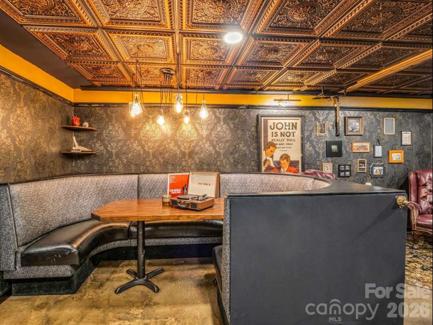 14 Penelope Street, Black Mountain, NC 28711.  MLS# CAR4394587, YatesRealty ID 34094. Hidden speakeasy