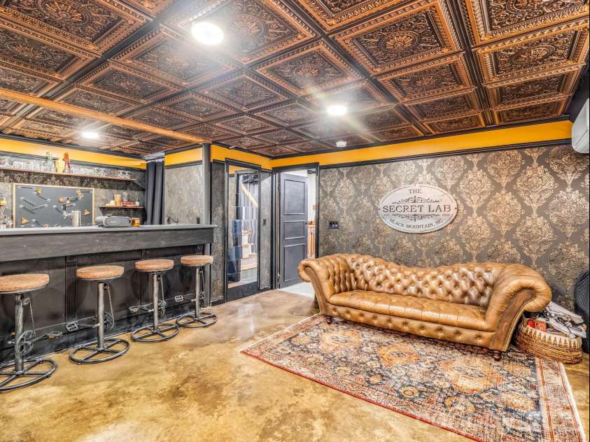 14 Penelope Street, Black Mountain, NC 28711.  MLS# CAR4394587, YatesRealty ID 34094. Hidden speakeasy