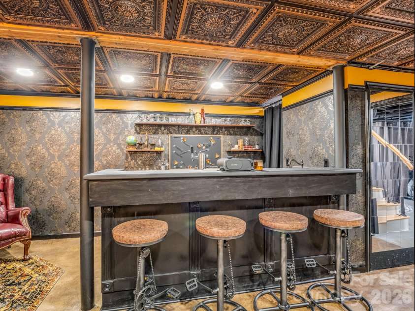 14 Penelope Street, Black Mountain, NC 28711.  MLS# CAR4394587, YatesRealty ID 34094. Hidden speakeasy