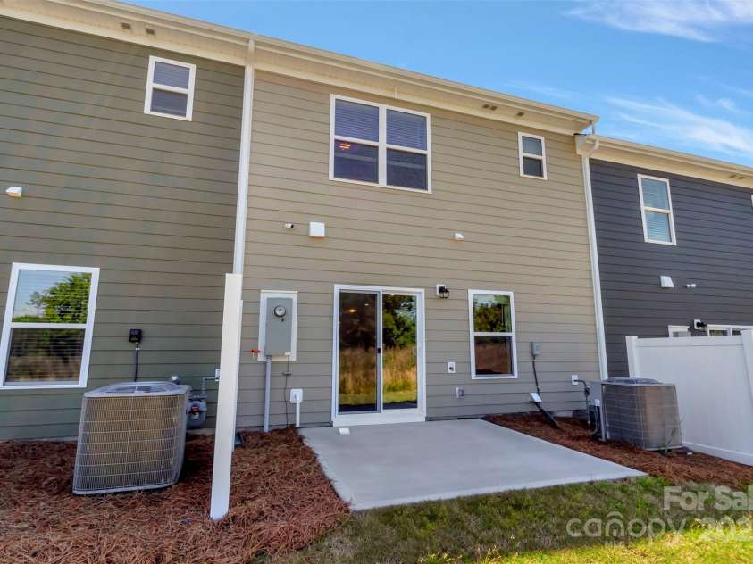 3665 Secrest Landing, Monroe, NC 28110.  MLS# CAR4295486, YatesRealty ID 34097. Back patio