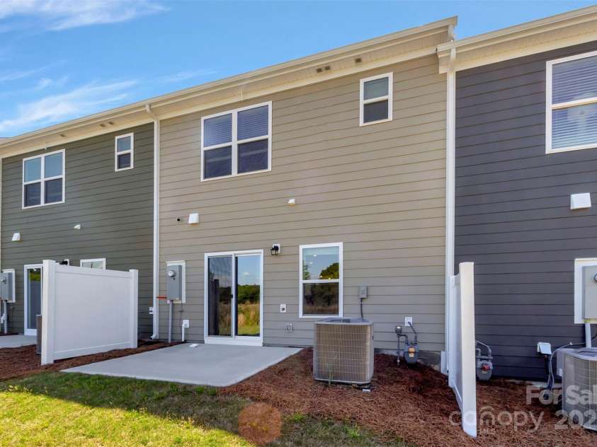 3665 Secrest Landing, Monroe, NC 28110.  MLS# CAR4295486, YatesRealty ID 34097. Back patio