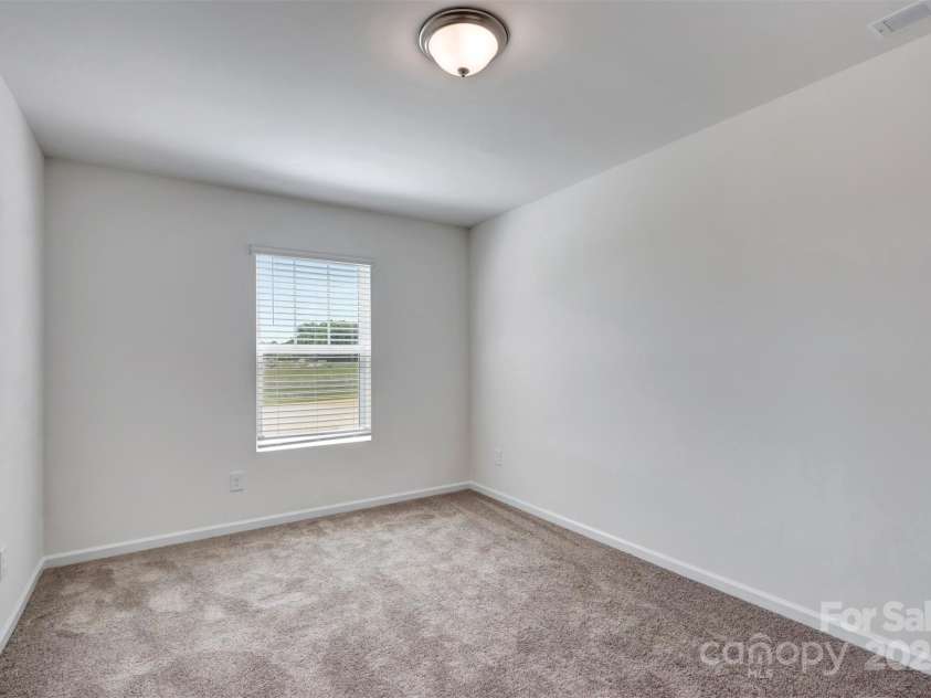3665 Secrest Landing, Monroe, NC 28110.  MLS# CAR4295486, YatesRealty ID 34097. Secondary bedroom