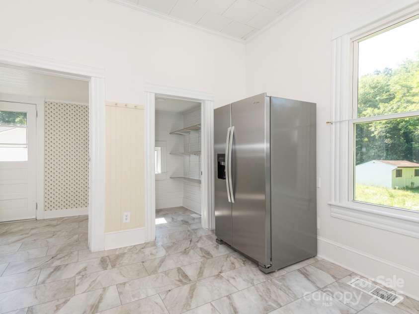 110 College Street, Marshville, NC 28103.  MLS# CAR4273371, YatesRealty ID 341. Kitchen into pantry & mudroom