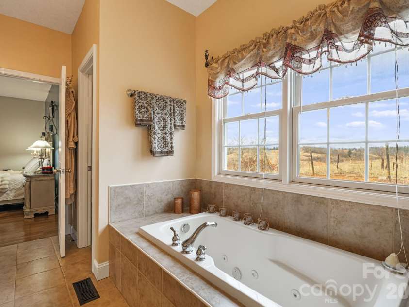 79 Bear Creek Hills Drive, Leicester, NC 28748.  MLS# CAR4338614, YatesRealty ID 3410. 