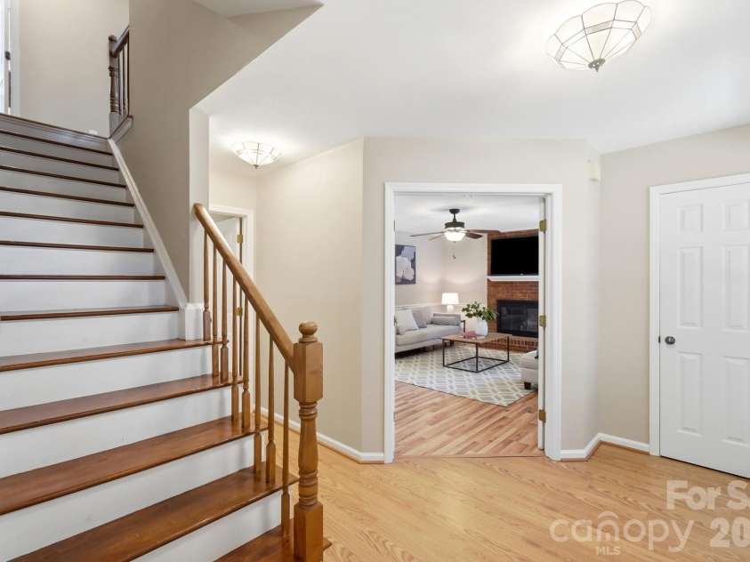 730 Fredricksburg Road, Matthews, NC 28105.  MLS# CAR4396481, YatesRealty ID 34100. Front Entry looking into the Family Room