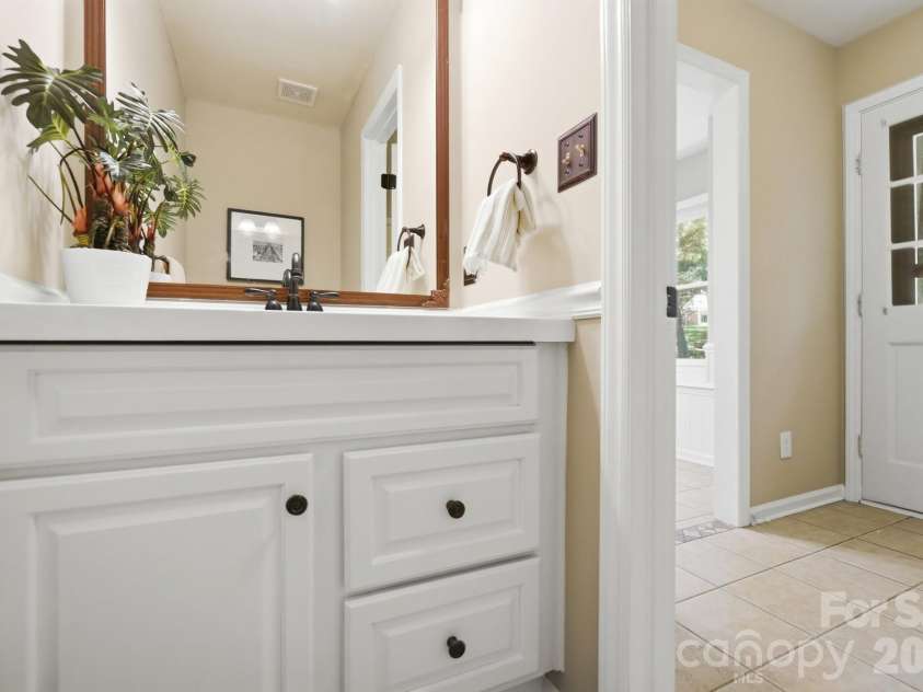 730 Fredricksburg Road, Matthews, NC 28105.  MLS# CAR4396481, YatesRealty ID 34100. Half Bathroom