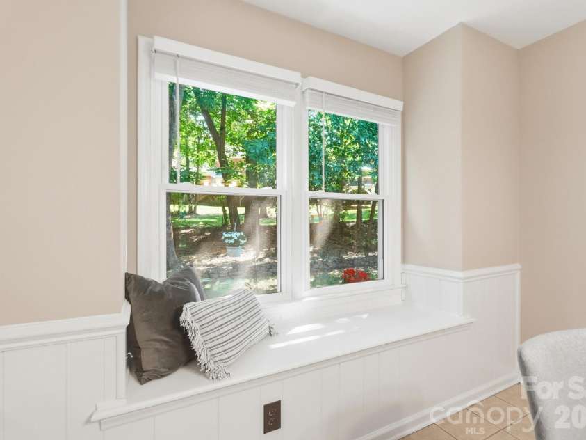 730 Fredricksburg Road, Matthews, NC 28105.  MLS# CAR4396481, YatesRealty ID 34100. Inset window w/bench