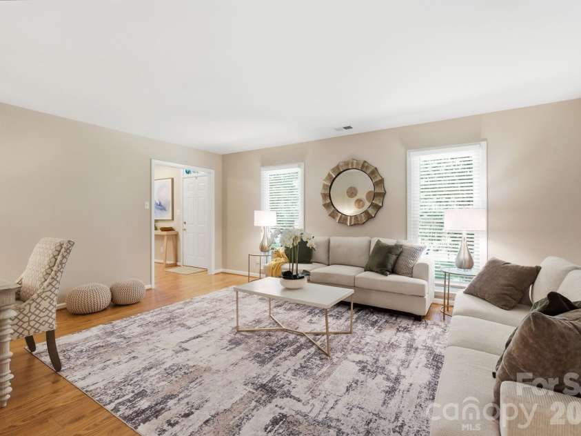 730 Fredricksburg Road, Matthews, NC 28105.  MLS# CAR4396481, YatesRealty ID 34100. Living Room w/Front Windows, Front Entry