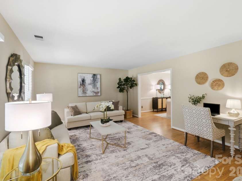 730 Fredricksburg Road, Matthews, NC 28105.  MLS# CAR4396481, YatesRealty ID 34100. Spacious Living Room