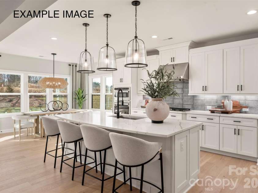 10931 Tyler Brook Lane, Mint Hill, NC 28227.  MLS# CAR4394346, YatesRealty ID 34101. Example Photo - Kitchen/Breakfast