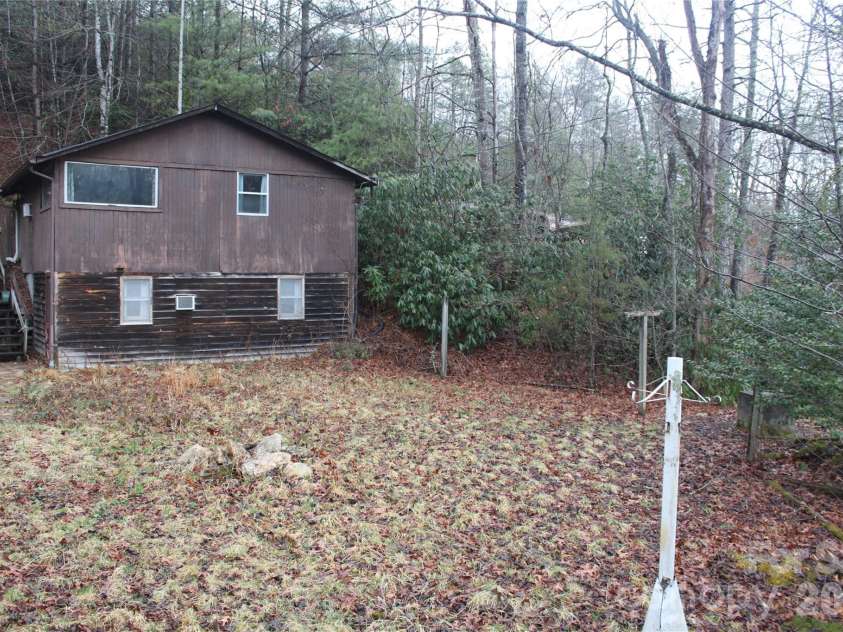 14 Irvin Road, Pisgah Forest, NC 28768.  MLS# CAR4349662, YatesRealty ID 3412. Back yard. 