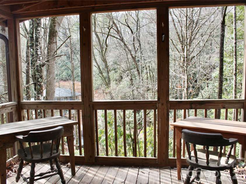 14 Irvin Road, Pisgah Forest, NC 28768.  MLS# CAR4349662, YatesRealty ID 3412. Covered deck off kitchen. 