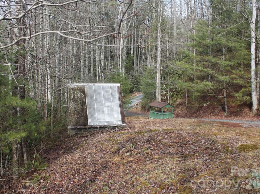 14 Irvin Road, Pisgah Forest, NC 28768.  MLS# CAR4349662, YatesRealty ID 3412. Front yard. 