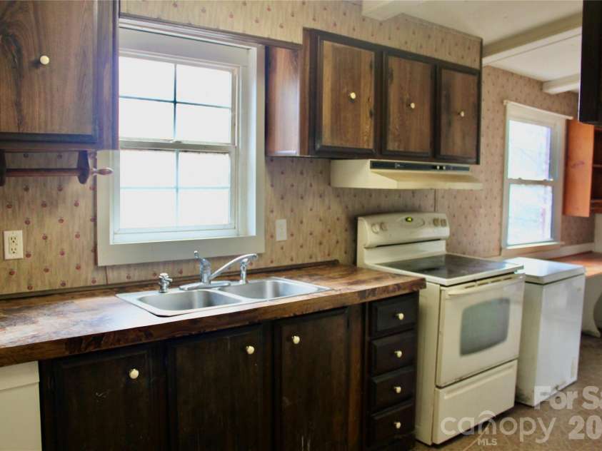 14 Irvin Road, Pisgah Forest, NC 28768.  MLS# CAR4349662, YatesRealty ID 3412. Kitchen.