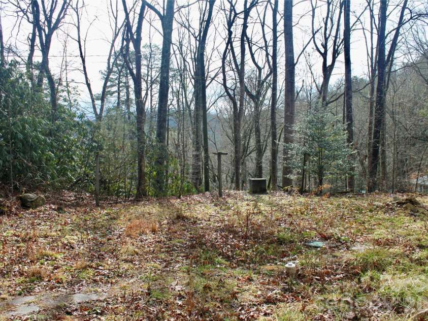 14 Irvin Road, Pisgah Forest, NC 28768.  MLS# CAR4349662, YatesRealty ID 3412. Yard with winter views. 
