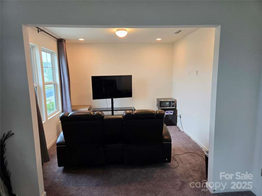 108 Fairfield Drive, Troutman, NC 28166.  MLS# CAR4289512, YatesRealty ID 34124. Upper floor primary bedroom with sitting area