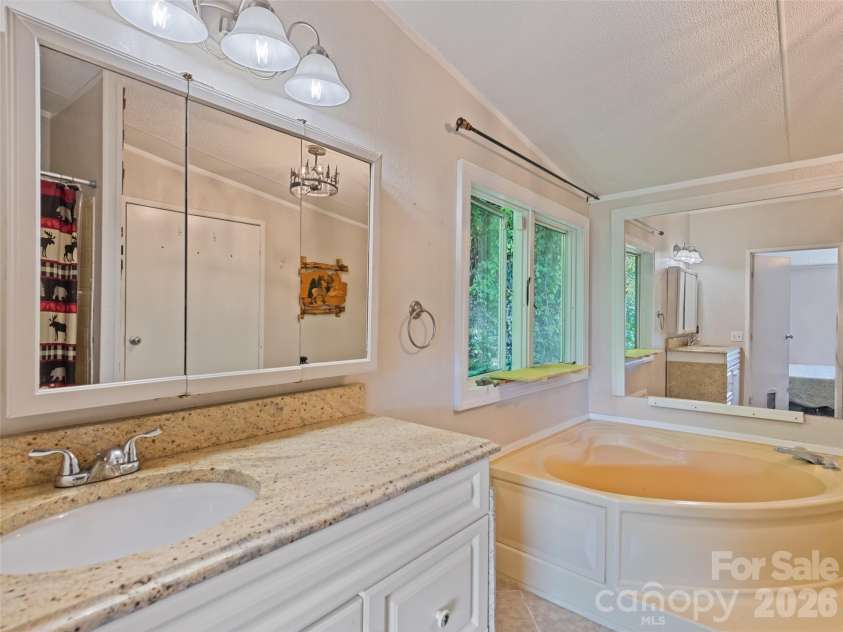 115 Slick Rock Ridge, Maggie Valley, NC 28751.  MLS# CAR4394968, YatesRealty ID 34136. 
