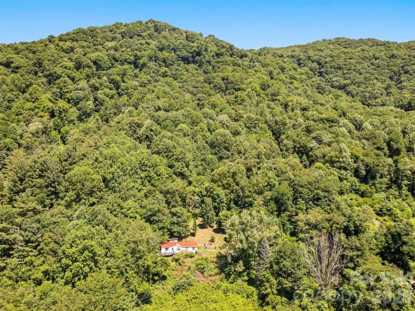 115 Slick Rock Ridge, Maggie Valley, NC 28751.  MLS# CAR4394968, YatesRealty ID 34136. 