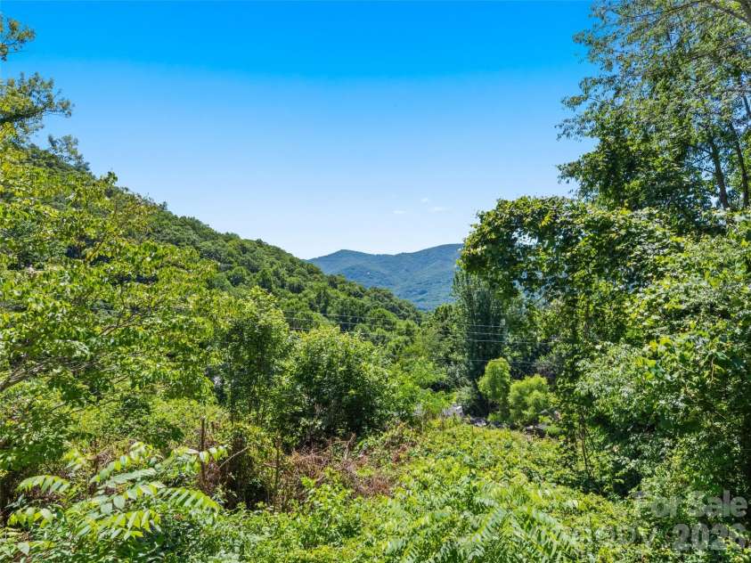 115 Slick Rock Ridge, Maggie Valley, NC 28751.  MLS# CAR4394968, YatesRealty ID 34136. 