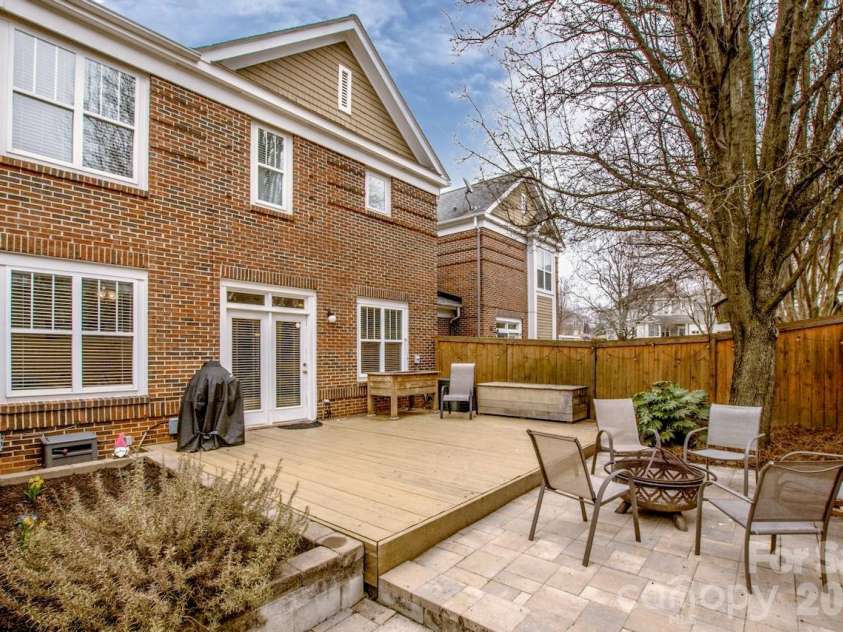 18714 Ramsey Cove Drive, Cornelius, NC 28031.  MLS# CAR4350743, YatesRealty ID 3414. Deck And Stone Paver Patio