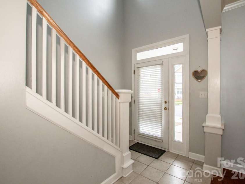 18714 Ramsey Cove Drive, Cornelius, NC 28031.  MLS# CAR4350743, YatesRealty ID 3414. Entrance With Side Light And Transom Window