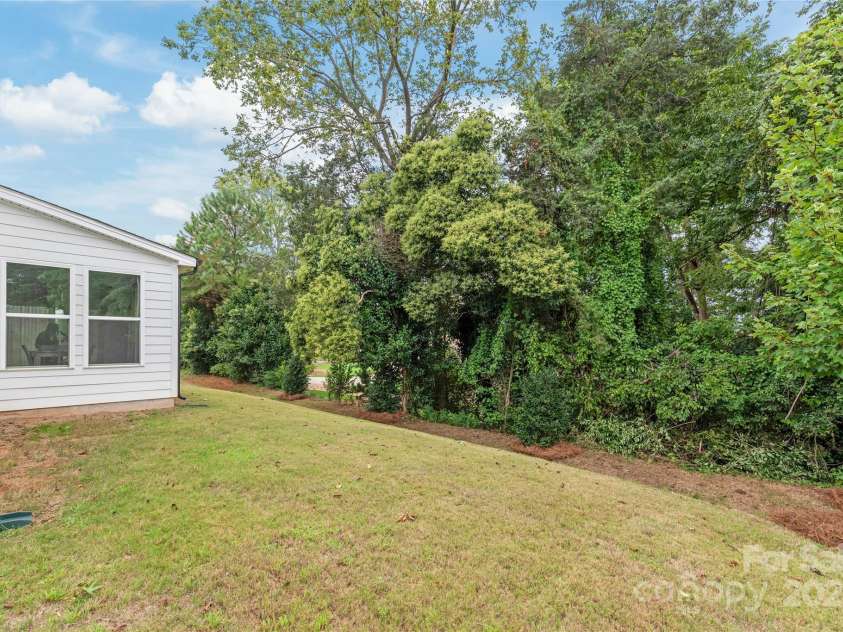 1507 Cedar Tree Drive, Belmont, NC 28012.  MLS# CAR4289479, YatesRealty ID 34147. Backs to trees for privacy