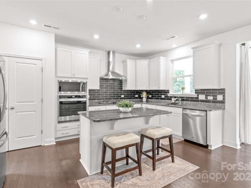 1507 Cedar Tree Drive, Belmont, NC 28012.  MLS# CAR4289479, YatesRealty ID 34147. Large center island with seating