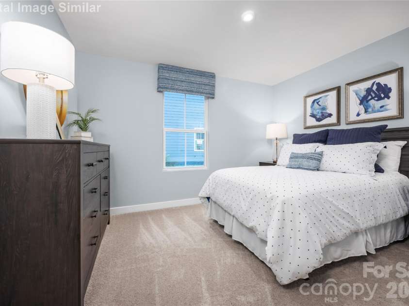 208 Linwood Estates Drive, Lexington, NC 27292.  MLS# CAR4393456, YatesRealty ID 34148. From weekend guests to every day, the room adapts beautifully.  Soft Lighting, plush bedding, and thoughtful touches make it a true retreat
