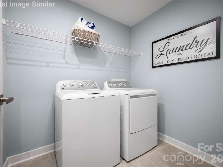 208 Linwood Estates Drive, Lexington, NC 27292.  MLS# CAR4393456, YatesRealty ID 34148. Laundry Room You'll Love.  Whether You're Sorting, Folding, or Tackling a Mountain of Towels, the Layout is Built for Efficiency.