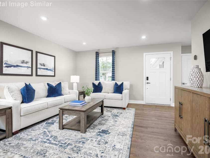 208 Linwood Estates Drive, Lexington, NC 27292.  MLS# CAR4393456, YatesRealty ID 34148. Step through the front entrance and you’re immediately greeted by a sense of openness and warmth. This great room is more than just a living space—it’s a statement.
