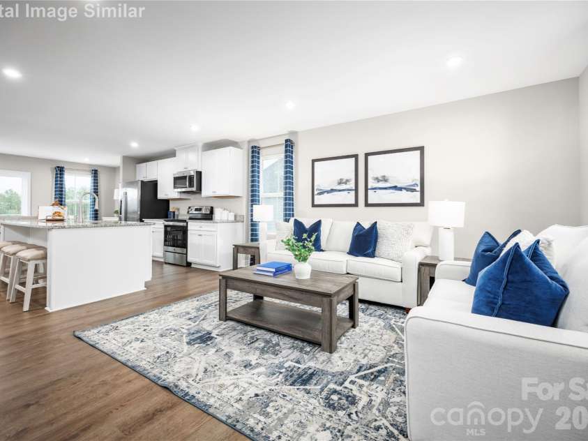 208 Linwood Estates Drive, Lexington, NC 27292.  MLS# CAR4393456, YatesRealty ID 34148. The open floor plan connects the kitchen to the living and dining areas, creating a natural flow that’s perfect for entertaining or keeping an eye on the kids while you cook. It’s a space that invites conversatio