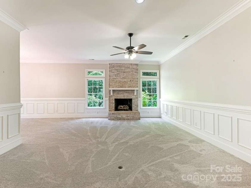 6907 Pleasant Drive, Charlotte, NC 28211.  MLS# CAR4280958, YatesRealty ID 34148. Beautiful fireplace..