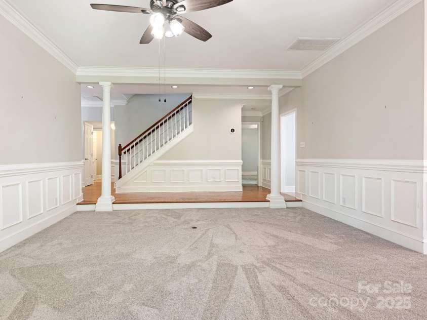 6907 Pleasant Drive, Charlotte, NC 28211.  MLS# CAR4280958, YatesRealty ID 34148. In a large living room...