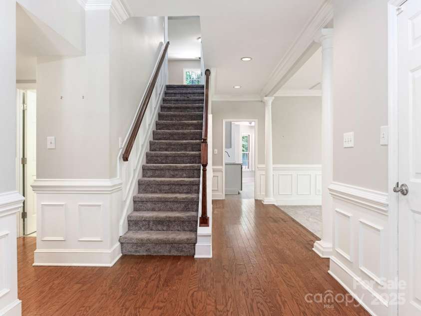 6907 Pleasant Drive, Charlotte, NC 28211.  MLS# CAR4280958, YatesRealty ID 34148. Stairway to the large bonus room
