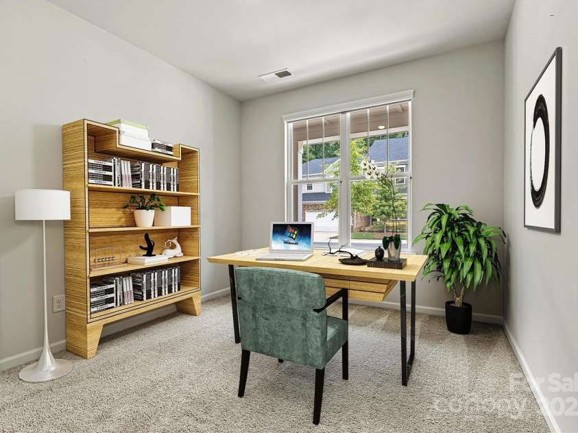 8233 Merryvale Lane, Charlotte, NC 28214.  MLS# CAR4293433, YatesRealty ID 34155. This virtually staged office highlights a serene and functional workspace—designed to inspire focus, productivity, and a sense of calm in your daily routine.