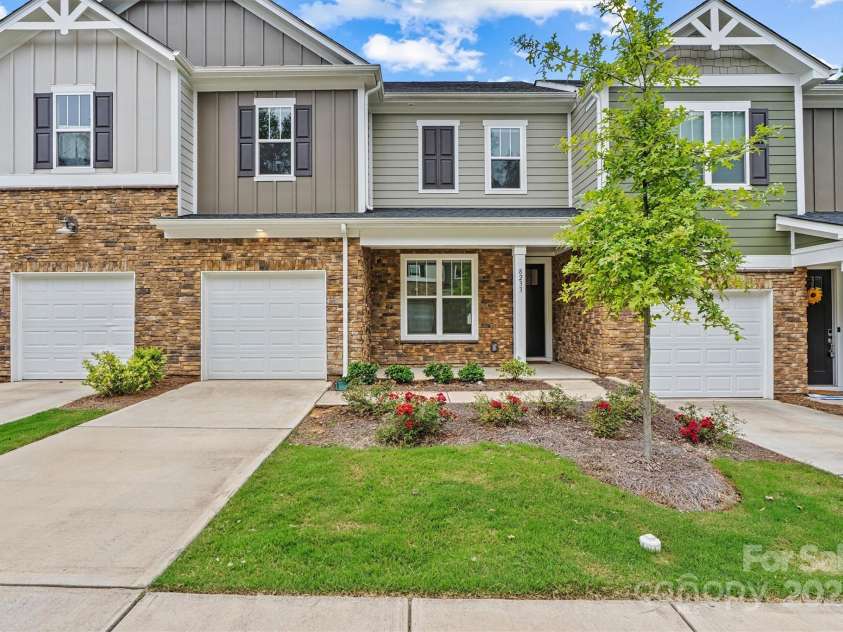 8233 Merryvale Lane, Charlotte, NC 28214.  MLS# CAR4293433, YatesRealty ID 34155. Welcome to your gorgeous townhouse in Redwood Rookery—where vibrant community living meets endless opportunities for fun, relaxation, and connection for all ages.
