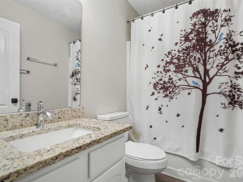 2716 Starnes Road, Charlotte, NC 28214.  MLS# CAR4395623, YatesRealty ID 34157. Secondary bathroom